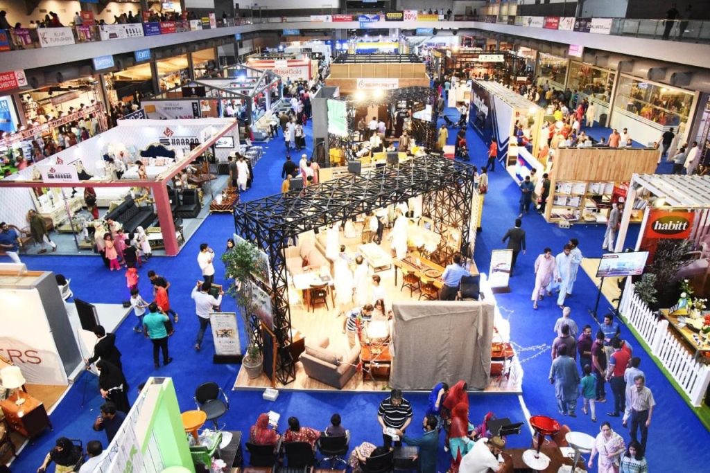 Aerial view of a packed Pakistan Interiors Furniture Expo exhibition hall